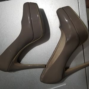 Nude pump heels.